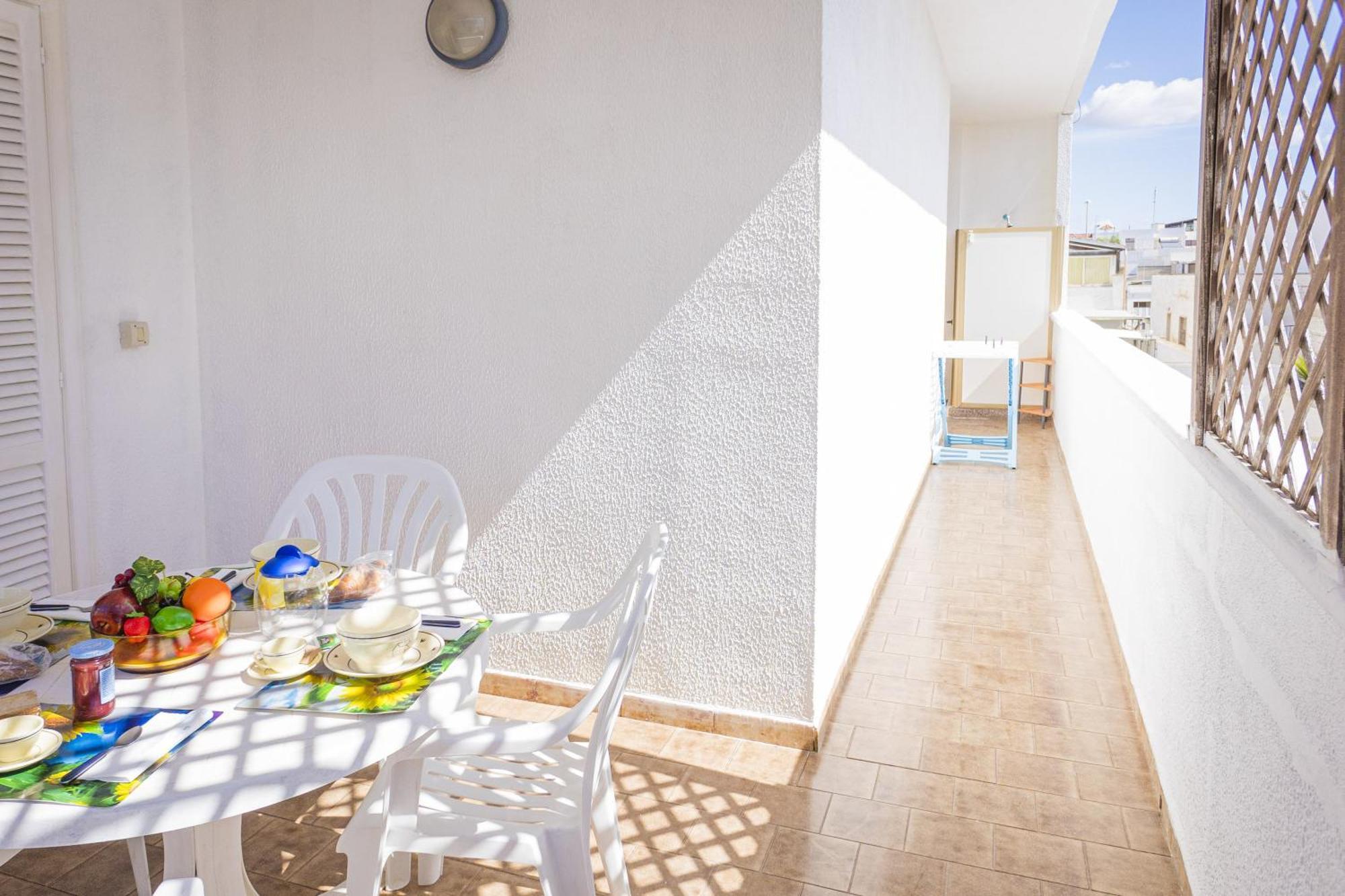 Torre Lapillo Apartment Sea View - Happy Rentals Порто-Чезарео Экстерьер фото